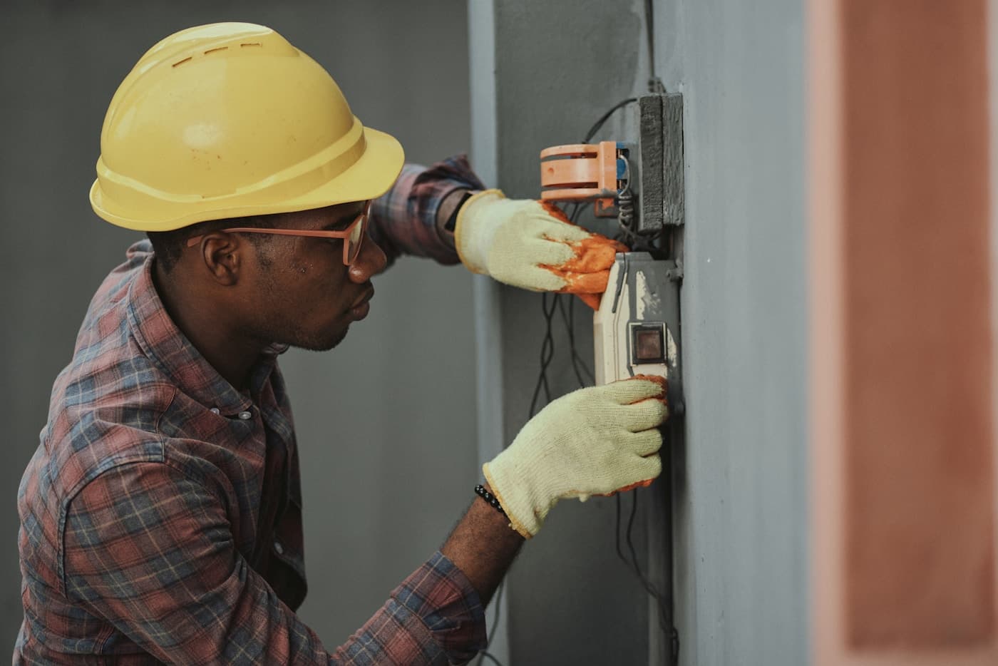 Workers wearing safety helmets at an industrial site