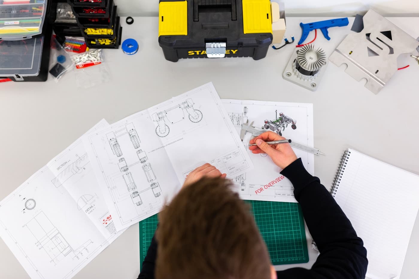Engineer performing technical inspection with digital equipment